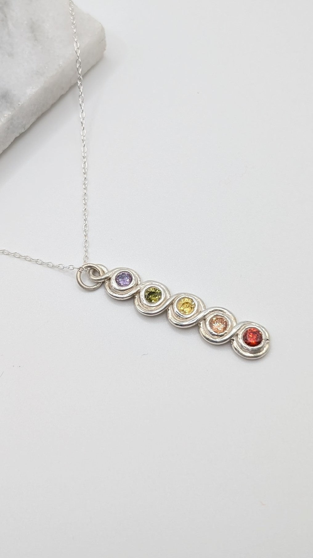 Rainbow infinite loop necklace