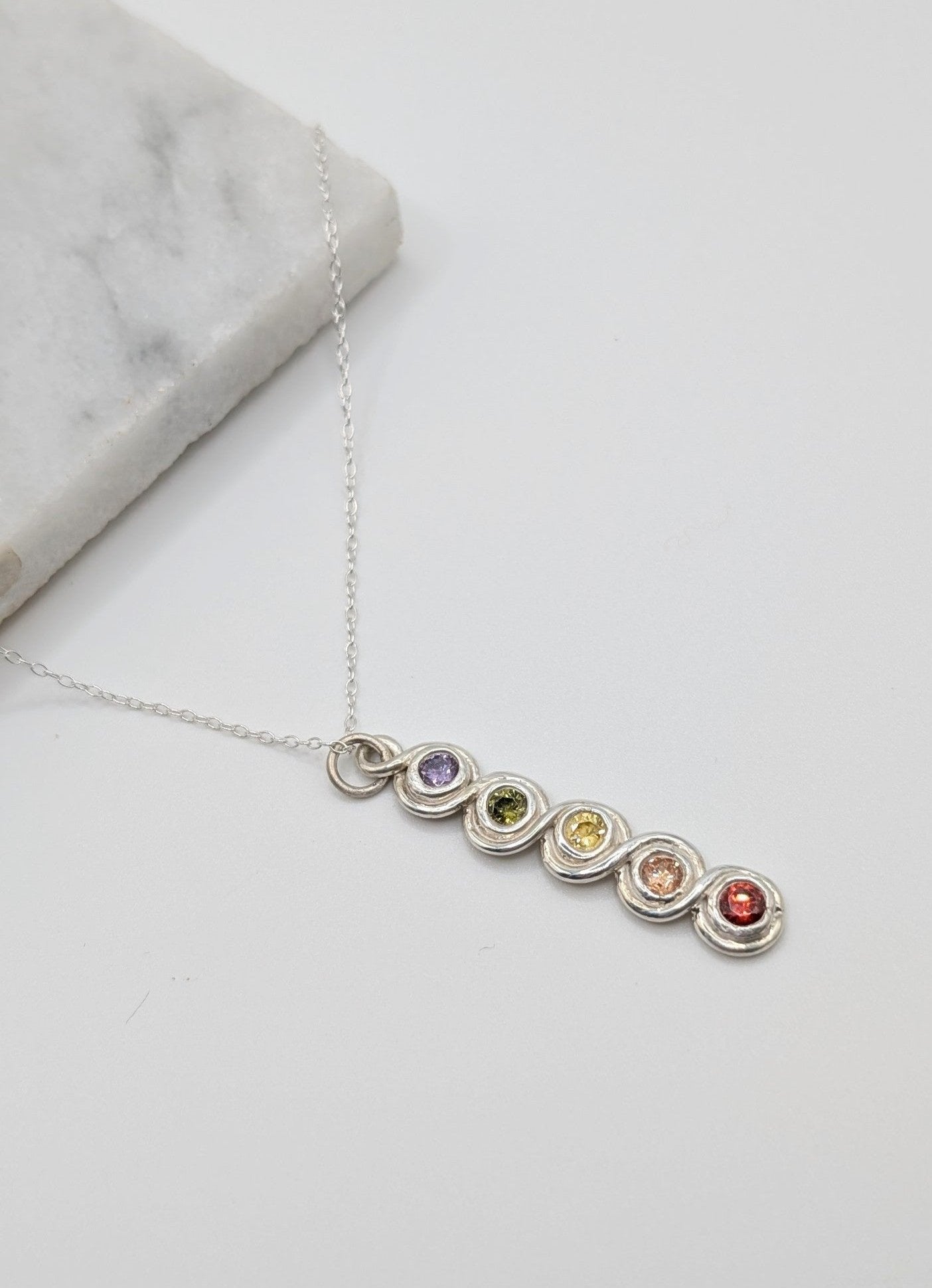 Rainbow infinite loop necklace