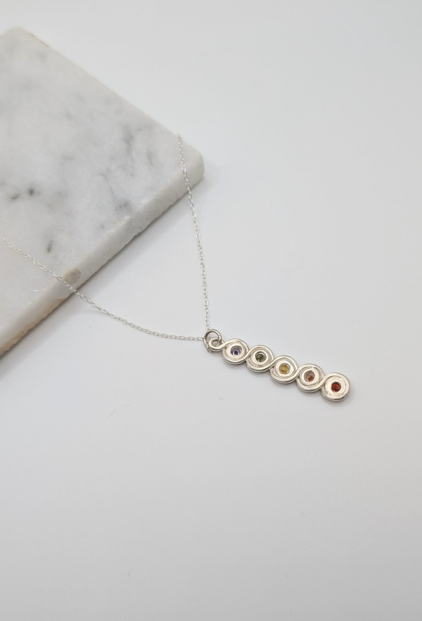 Rainbow infinite loop necklace